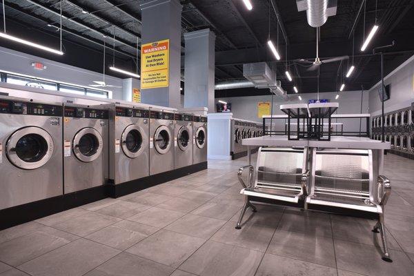 High tech washers and dryers with credit card readers.