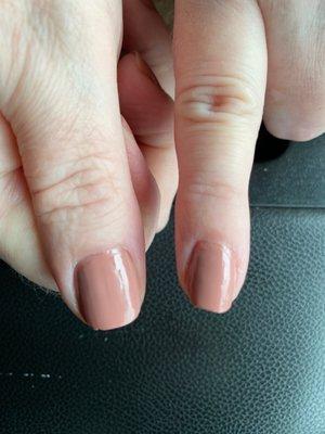 Nails not filed straight and polish blotchy on end