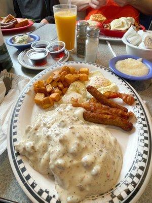 Country Breakfast; biscuit with sausage gravy, 2 eggs, bacon, sausage links and country potatoes! Delicious!!