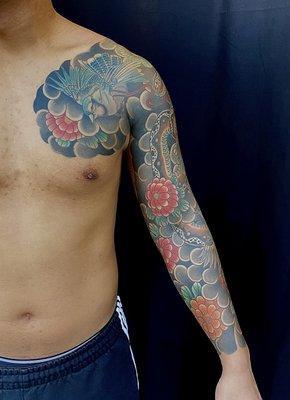 Full sleeve with chest panel of blue bird, snake and chrysanthemum by Nuco