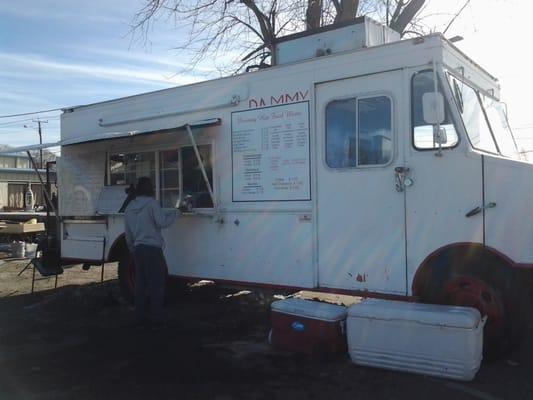 In the midst of a depressing flea market, a Mexican food truck.