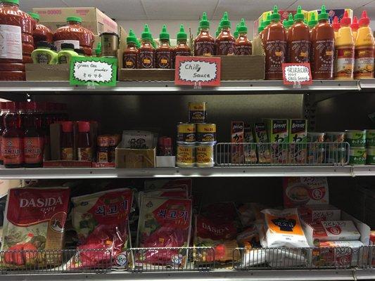 Hot sauces (sriracha, sambal olek, sweet chili sauce, etc.), wasabi pastes/powders, soup bases, rice vinegar, soy sauce, sesame oil, etc.