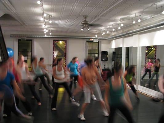 Zumba Party! Sweat it out overlooking Six Corners in our second story studios and recharge in our cozy boutique & lounge area!