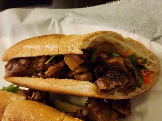 Pork Banh Mi, missing a few common ingredients like the mayo, daikon, and jalapeños, but really good on a perfect baguette.