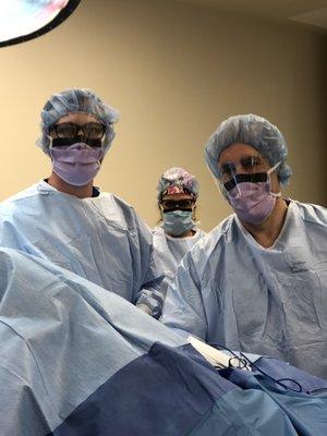 Dr. M and Kyle working hard in the operating room