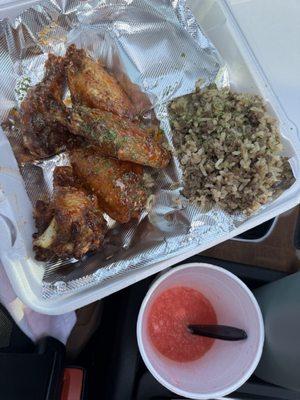 Wings & dirty rice + a snocone from the other truck in the lot