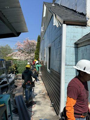 New siding getting installed in hasbrouck heights