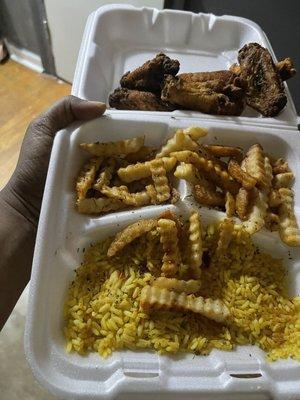 Burnt chicken, cold fries and rice