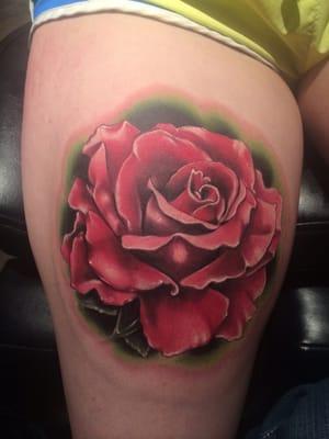 Realistic rose tattoo by Jeremy Miller