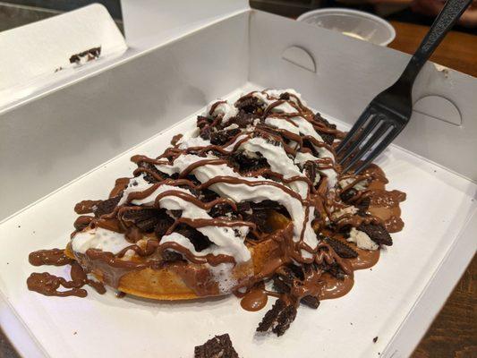 Oreo waffle with whipped cream ( ice cream is on the side )