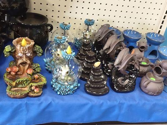 We carry a variety of backflow incense burners. The baby dragon globe is lighted..