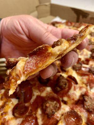 Thin crust is the house specialty. Plenty of sauce without soggy crust. #UpCloseSavor