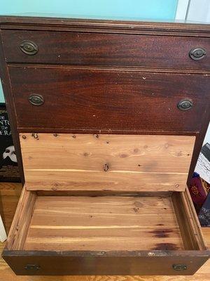 Chest of drawers with cedar in bottom drawer