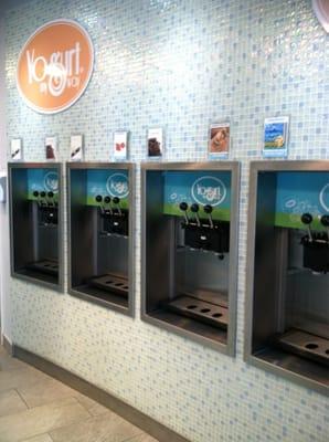 A huge line of yogurt/soft serve machines, there's even a swirl option!