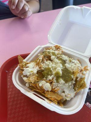 Chilaquiles. These had green sauce and chicken tinga.'