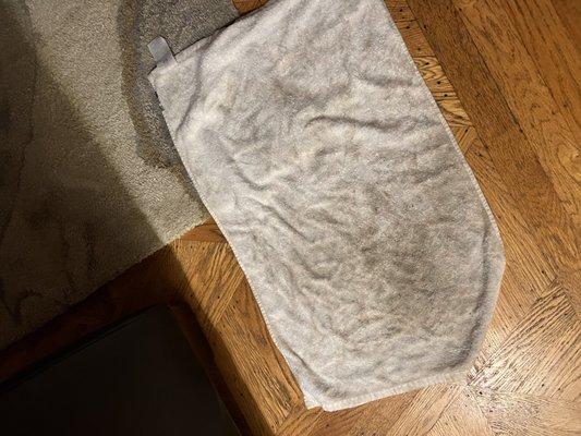 Towel after cleaning the water left on our hardwood floor (we just had house clearers the day before so the floors were just cleaned)