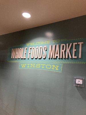 Inside sign at Whole Foods Market on Miller Street, posted as you enter the store.