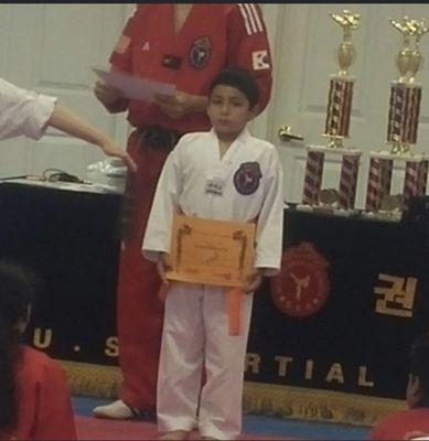 This is me when I was younger and had gotten my orange belt that's when I fell in love with karate thanks to my master