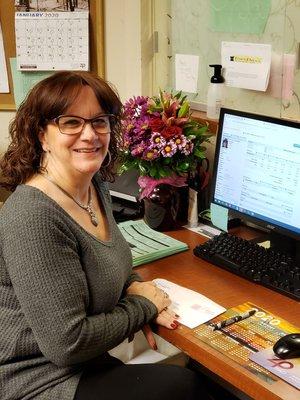 Tracy always greets our patients with a warm and friendly smile