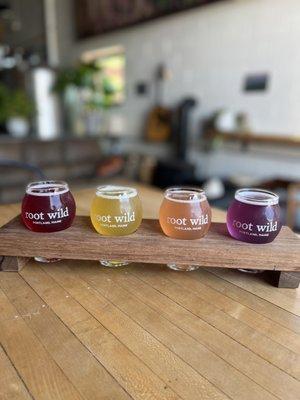 Kombucha Flight of 4 (~$12): blueberry, pineapple, grapefruit, and Purple Wave