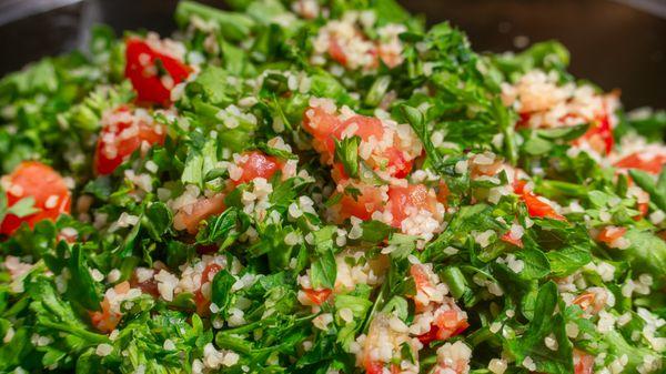 TABOULEH SALAD
 
 Chopped mint, parsley, green onion and diced tomatoes mixed with cracked wheat, lemon juice, salt and our specialty spices