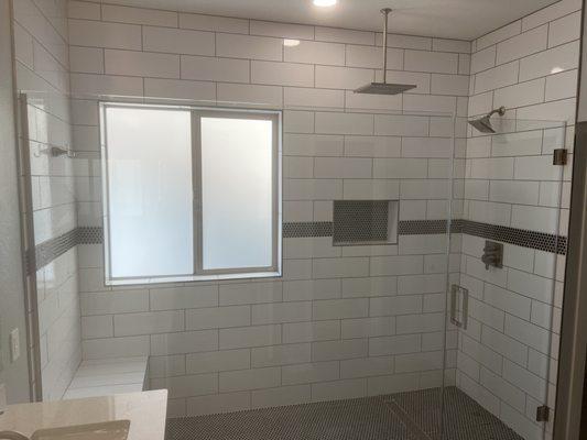 Glass shower enclosure