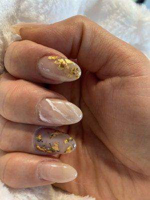 Almond shape acrylic nails.