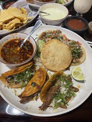 Barbacoa tacos with they are consomé. Delicious food