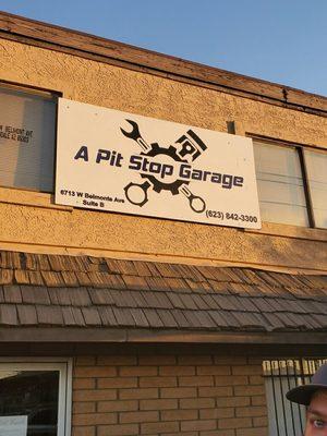 A Pit Stop Signage