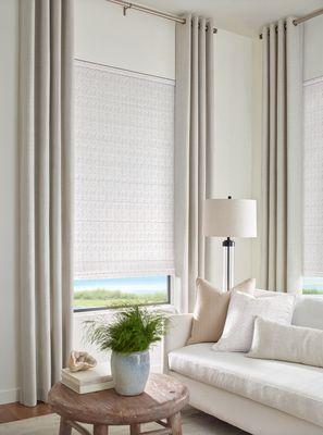 Seema Krish designer Roman Shades in wave design paired with complimentary drapes make a beautiful statement.