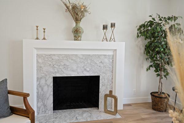 Remodeled living room with updated fireplace. Full remodel of home took 13 weeks from start to finish.