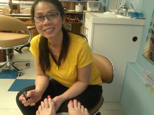 Ms. Cindy working on a pedicure.