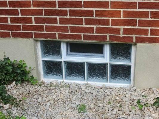 Picture of a standard basement window.