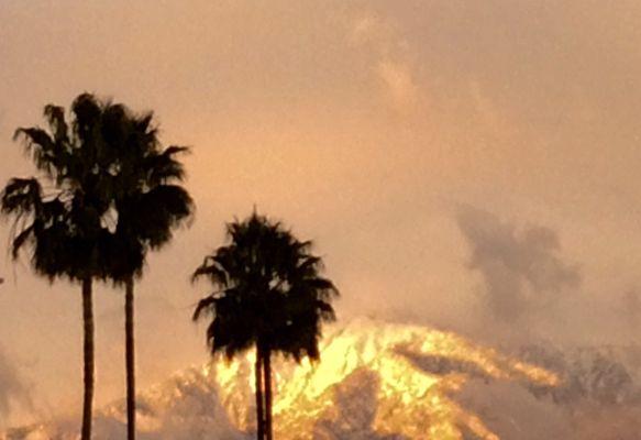 Fog-shrouded Mt. Baldy reflects light from the sinking sun during recent storms.