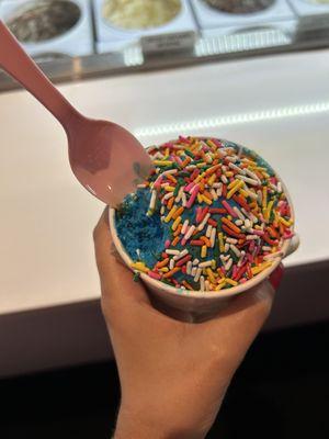 Cookie Monster ice cream with rainbow sprinkles