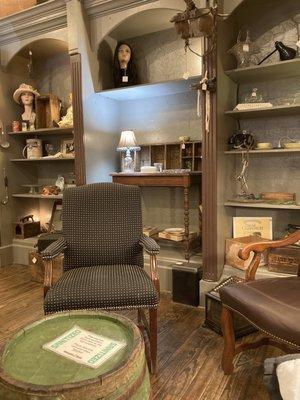 Comfortable seating and antiques on display.