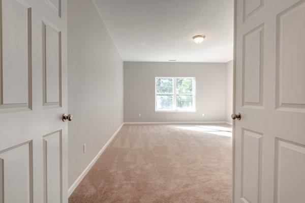 Imagine walking into your master bedroom through these white double doors!