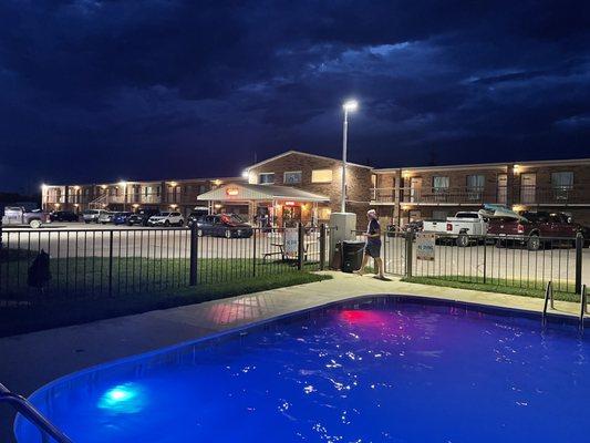 Pool and motel at night