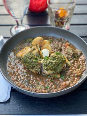 Roasted Golden Tile Fish, carrot top chimichurri, braised lentils with smoked pork and vegetables