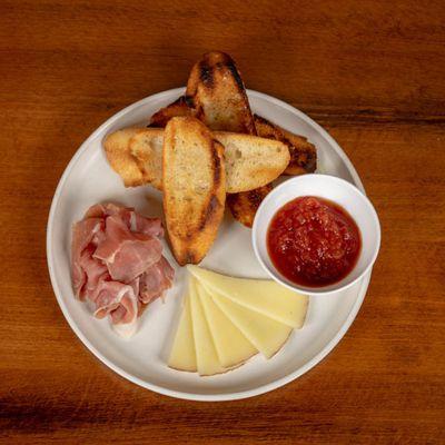 Pan Con Tomate: jamón serrano, tomato marmalade salsa, manchego, garlic baguette toast