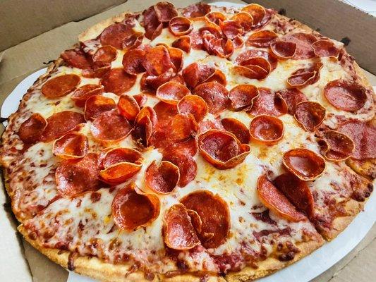 Thin crust with traditional pepperoni and old world pepperoni