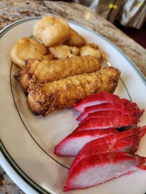 Appetizer combo. Yummy shrimp, egg roll and BBQ pork