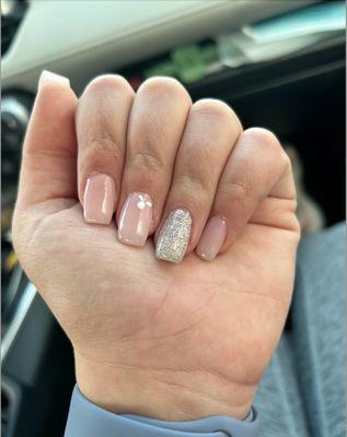 Simple acrylic nails; around $100 including tax