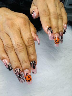 Halloween nails done by a Vicki