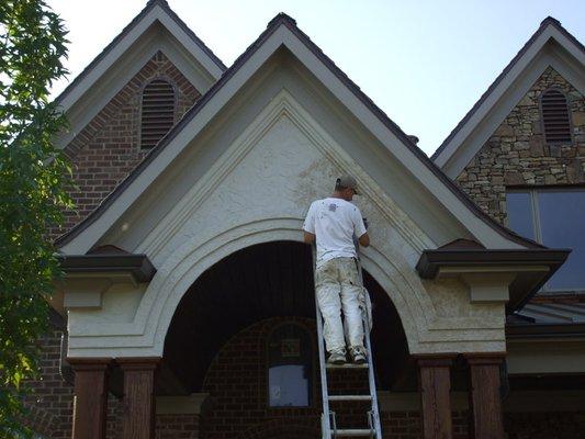 New stucco, then adding an aged look to it.