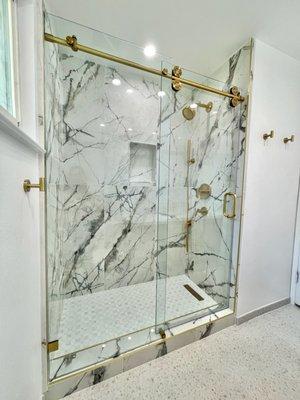 Crescent Series Frameless Shower Slider in Satin Brass Hardware and Clear Glass