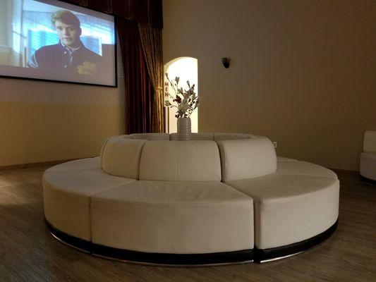 Enjoy the theather room before or after your treatment