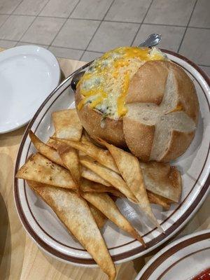 Spinach and artichoke dip In bread bowl