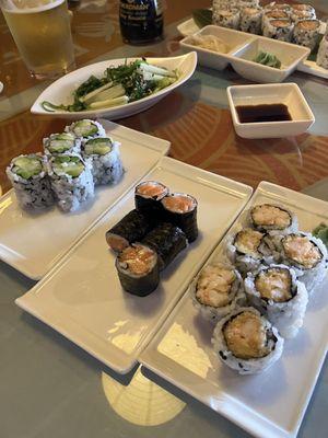 AAC roll, salmon roll, spicy shrimp roll, and seaweed salad