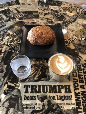 Chocolate croissant, cortado with sparkling water sidecar.